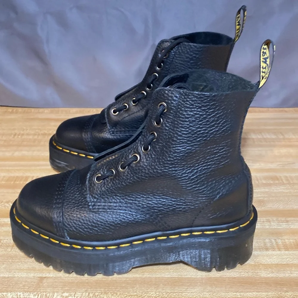 Dr. Martens Black Pebbled Leather Platform Lace-Up Boots with Yellow Stitching